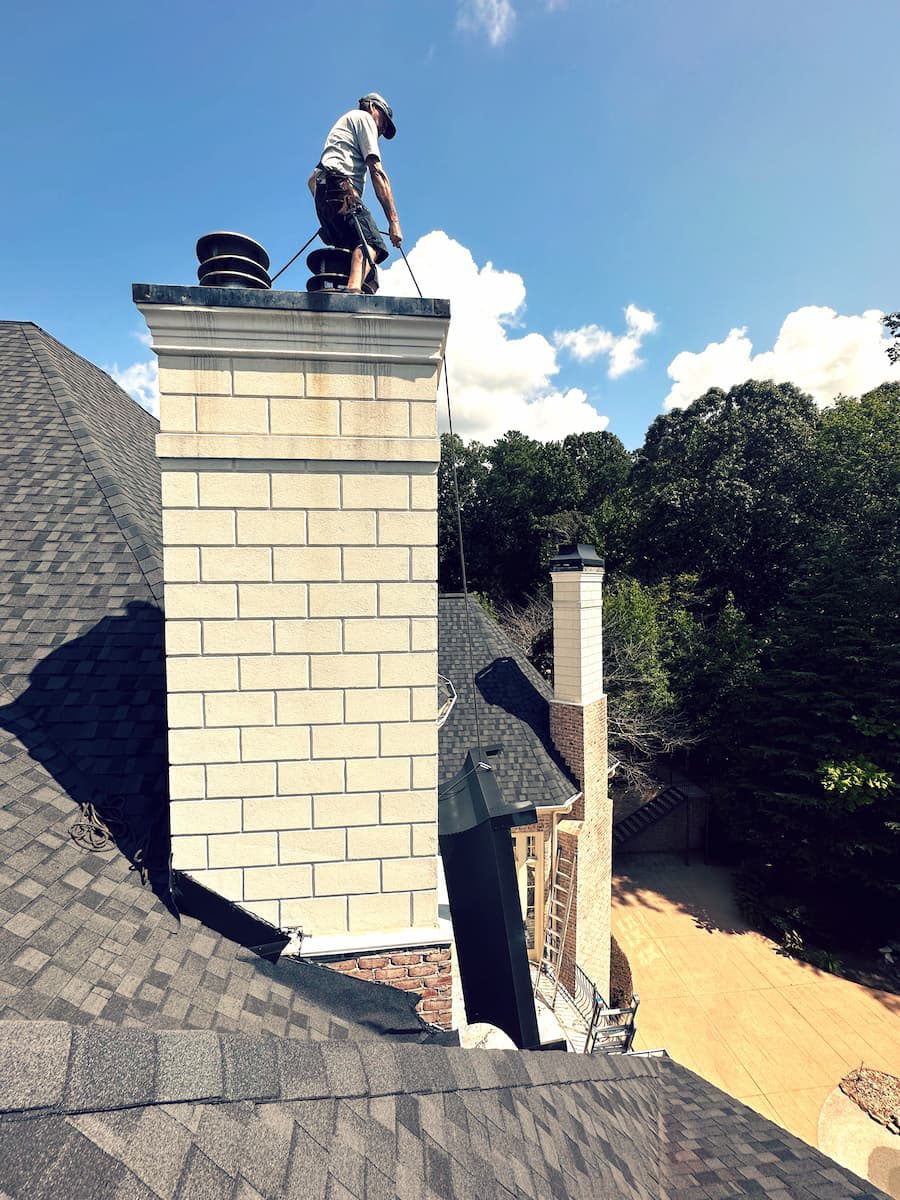 Installing chimney chase cover and chimney shroud in Roswell GA.